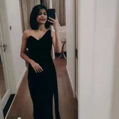 A classic black one-shoulder gown for an unforgettable corporate event. Simple, elegant, and professional.