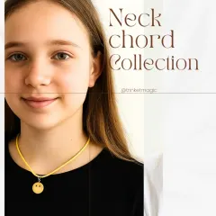 Nothing beats seeing my creations bring a smile to someone's face. This smiley charm on a bright yellow cord is part of my Neck Chord Collection, perfect for a fun, everyday look. It's lightweight, trendy, and super cute.