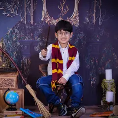 Wingardium Leviosa! Bringing a little bit of Hogwarts magic to the studio is always fun. This Harry Potter themed session lets your child's imagination run wild, creating portraits that are both playful and enchanting.