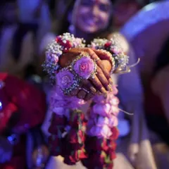 A close-up of our pink rose and baby's breath kalire. This is a romantic and popular choice for brides and their bridesmaids.
