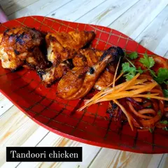 You can't go wrong with a classic. Our Tandoori Chicken is marinated in a blend of traditional spices and yogurt, then cooked to juicy, smoky perfection in the tandoor. A true Mughlai essential.