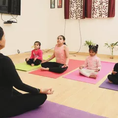 A moment of calm. I guide the children in simple meditation and breathing exercises to help them find their center. Learning to sit in stillness is a powerful tool for emotional regulation, even for the youngest minds.