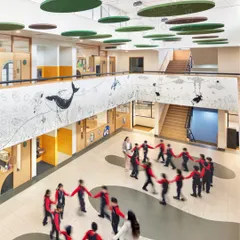 The central atrium at GD Goenka Public School, Vasant Kunj, is the vibrant heart of the school. With ceiling panels mimicking a forest canopy and whimsical art, this space transforms a simple corridor into a hub for play, friendship, and imagination.