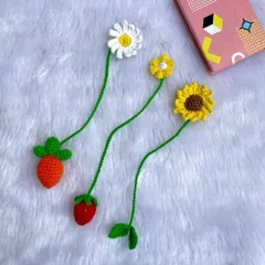 A fun and cute set of bookmarks, including a daisy, a sunflower, and even a little strawberry and carrot. Perfect for adding a touch of whimsy to your reading.