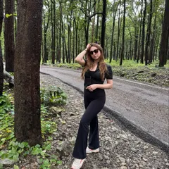 A casual all-black look with flared pants and a top, perfect for a day of exploring. This was shot in the beautiful forests of Jim Corbett.