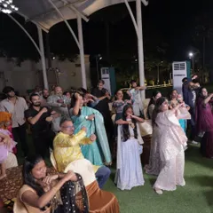 A group of guests learning a spontaneous dance routine at a Haldi and Sangeet event in Tuticorin. I can provide on-the-spot choreography to get everyone involved.