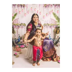 Yashoda's love for her little Krishna. This beautiful portrait of a mother and son captures the divine and eternal bond they share, set against a stunning Janmashtami backdrop.