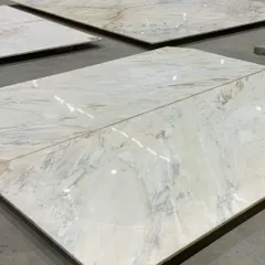 The soul of a luxury space often lies in the quality of its materials. This image shows large slabs of Italian marble selected for a home makeover, chosen for their beautiful veining and polished finish to create an elegant look.