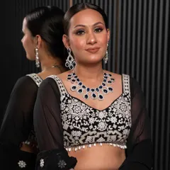 A gorgeous client showcasing a modern diamond and sapphire style necklace. Our rental jewellery collection includes contemporary pieces perfect for gowns and Indo-Western outfits.
