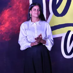 A candid moment on stage during a speaking engagement. I am comfortable and confident addressing audiences of all sizes.
