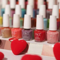 A close-up of our T&T Nail Lacquer collection, surrounded by hearts. Your nails are your canvas, and we have the perfect shades for you to paint your story.