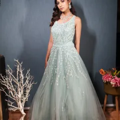 A confident pose in our beautiful blue rental gown.