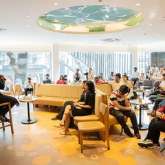 A full view of the event space for Ashish Godya's book launch, demonstrating how we transform a cafe into a professional literary event venue.