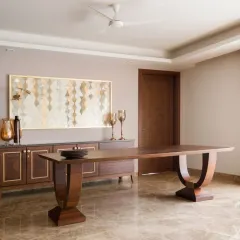 The finished eight-seater dining table at Casa K, brought to life from our sketches. Crafted with an oak wood cross-veneer top and sculptural base, it is designed to withstand everyday use while anchoring the room with elegance.