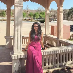 Posing in a traditional Indian outfit in Khajuraho. This image showcases my ability to model different styles, including ethnic wear, in a beautiful travel setting.