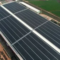 An aerial perspective of our 5.3 MWp solar project for Moon Beverages Ltd in Dhaulana, UP. Covering over 34,000 square meters, this installation is a prime example of how large-scale manufacturing facilities can achieve significant decarbonization.