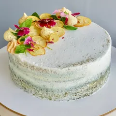 Zesty, herby, and unapologetically unique. My Lemon Basil Naked Cake is made with a light lemon basil sponge, balanced with lemon curd, and topped with candied lemons and fresh basil leaves for an adventurous dessert.
