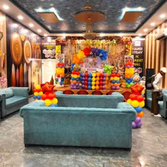 A wide view of the Cocomelon themed birthday party at Nand Utsav AC Banquet Hall. This shows how my decorations can fill a large space, including stage decor and seating arrangements.