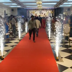 A grand entrance for a wedding reception at CMA Palace. The red carpet and cold pyrotechnics create a spectacular welcome, showcasing how we manage special effects to elevate your event.