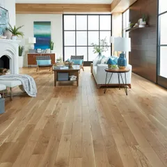 This is my go-to look for a modern, sun-filled living room. The wide planks of light, natural wood flooring amplify the natural light and create an atmosphere that is both expansive and inviting.