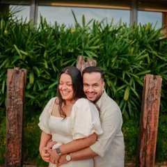 A joyful, candid hug captured at a resort. These relaxed moments show the couple enjoying their getaway, making the proposal feel like a natural part of their special trip.