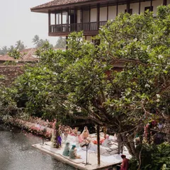 In the serene backwaters of Sri Lanka, we designed this floating mandap to feel like a natural extension of the landscape. The ceremony took place on the water, surrounded by lush greenery and soft florals, creating a peaceful and deeply personal moment for the couple.