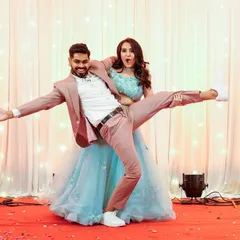 A hilarious and high-energy performance by the couple. This photo perfectly captures their fun-loving personalities.