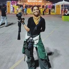 All geared up and ready to shoot at an outdoor festival. This is me in my element, equipped with my camera and gimbal, ready to capture the energy of a live event.