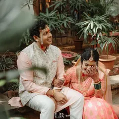A shared laugh between the couple during a quiet moment away from the crowd. Our goal is to make you feel comfortable enough to be yourselves, allowing us to capture your true connection.