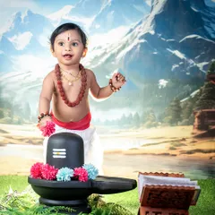 A little devotee with a powerful presence. This portrait of our little Shankar Bhagwan captures a sense of serenity and innocence, creating a truly special memory.