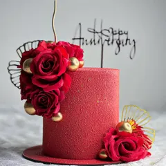 Another look at our stunning red velvet anniversary cake. The texture is created with a special spray technique, giving it a luxurious, velvety finish.