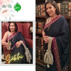 A beautiful patron carrying our silver-sequined party potli, the perfect accessory to complement her elegant saree. Our creations are designed to complete your look with a touch of handmade charm.