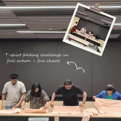This is the T-shirt folding challenge in full action. I love incorporating fun, competitive activities into my workshops because it gets everyone laughing, engaged, and learning practical skills without even realizing it.
