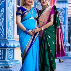 An expecting mother poses with a family member during her baby shower. I make sure to get photos with all the important guests who come to share their blessings.