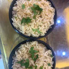 For those who prefer a healthier option, I offer brown rice with my meals. It's a great source of fiber and has a lovely nutty flavor.