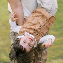 Letting kids be kids is my secret to getting the most genuine expressions. Forget stiff poses; we'll run, play, and even hang upside down to capture the wild and wonderful spirit of childhood.