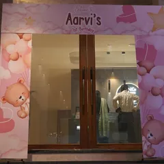 This custom-printed entrance arch was designed for a teddy bear themed first birthday. The soft pink colors and cute graphics create a sweet and personal welcome for the little one's party.