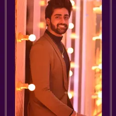 A great look is all about the right angles and confidence. Here's another shot of Swaminathan at the Vijay Television Awards, looking sharp against the bright lights of the event.