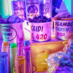 "Mogambo khush hua!" I use custom-printed mugs with iconic Bollywood dialogues and villain names like 'Kaidi No. 420' to serve drinks, adding a layer of humor and nostalgia to your party.