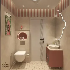 This dreamy and playful kids' bathroom features pink and white striped walls, terrazzo flooring, and a custom panda-shaped mirror.