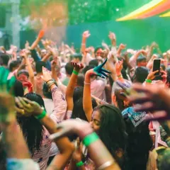 A sea of hands in the air, covered in color. This is the view from my console, and it’s the ultimate reward. I read the crowd's energy and respond with beats that keep them jumping.