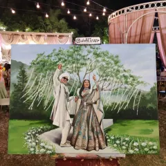 We had the absolute honour of doing a live wedding painting for Prajakta Koli and Vrishank Khanal. Capturing their joy against the beautiful outdoor decor was a dream come true for us.