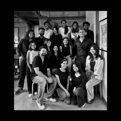 A black and white portrait of our incredible team. We've grown so much over the years, but our spirit remains the same.
