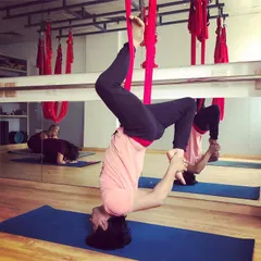Yes, men can and absolutely do enjoy aerial yoga. It's a fantastic practice for anyone looking to improve flexibility and core strength, especially for those who do intensive workouts like weightlifting.