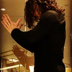Behind the scenes in the green room before a show. A moment for warm-ups, reflection, and maybe trying to master the art of taking a good selfie.