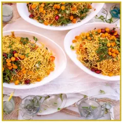 The iconic taste of Mumbai street food, perfected for your event. Our Sev Puri is a burst of tangy, spicy, and crunchy flavors, beautifully presented in white bowls.