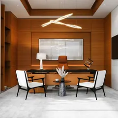 This executive cabin is designed for focus and authority. We used rich wood wall paneling to create a warm, sophisticated backdrop, paired with a sleek, modern desk and a striking contemporary chandelier that acts as a centerpiece.