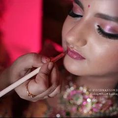 The final touch of lipstick. I teach my students the importance of precise lip lining and application for a long-lasting, perfect pout.
