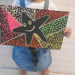 This vibrant starfish was created using a pointillism-inspired dot painting technique. It's a fantastic way for kids to learn about color blending and improve their focus.