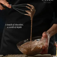 My process always starts with the best ingredients. I only use real couverture chocolate, which I melt and work with carefully to bring out its true depth and richness. You can taste the difference this commitment makes in every single layer.